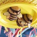 Peanut Butter Bumble Bees 1/4 c. butter or margarine, softened 1 c. creamy peanut butter 1 c. powdered sugar 1 1/2 c.