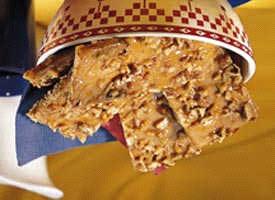 Quick Praline Bars 24 graham cracker squares 1/2 c. packed brown sugar 1/2 c. butter or margarine 1/2 tsp. vanilla 1/2 c. chopped pecans Heat oven to 350º.