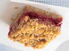Cranberry Squares 1 1/2 c. quick-cooking oats 1 1/2 c. flour 1 c. firmly packed light brown sugar 1 tsp. baking powder 3/4 c. cold butter, softened 1 c. Brandied cranberry sauce Preheat oven to 350.