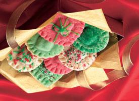 Holiday Surprise Sugar Cookies 1 pouch sugar cookie mix 1/3 c. butter or margarine, melted 1 egg 2 Tbs.
