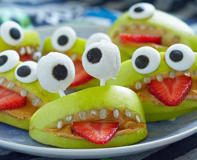 Party snacks 20 Monster Apples Ingredients Granny Smith apples cut into segments Natural peanut butter Strawberries Sunflower seeds (for teeth) Mini white marshmallows (for eyes) Chocolate chips (for