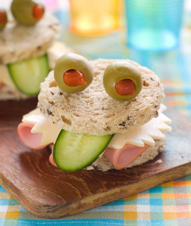 Froggy Sandwiches Ingredients Wholegrain bread Ham Cheese Cucumber Olives or cherry tomatoes for eyes Toothpicks Method 1. Cut bread into circles with a cookie cutter 2.