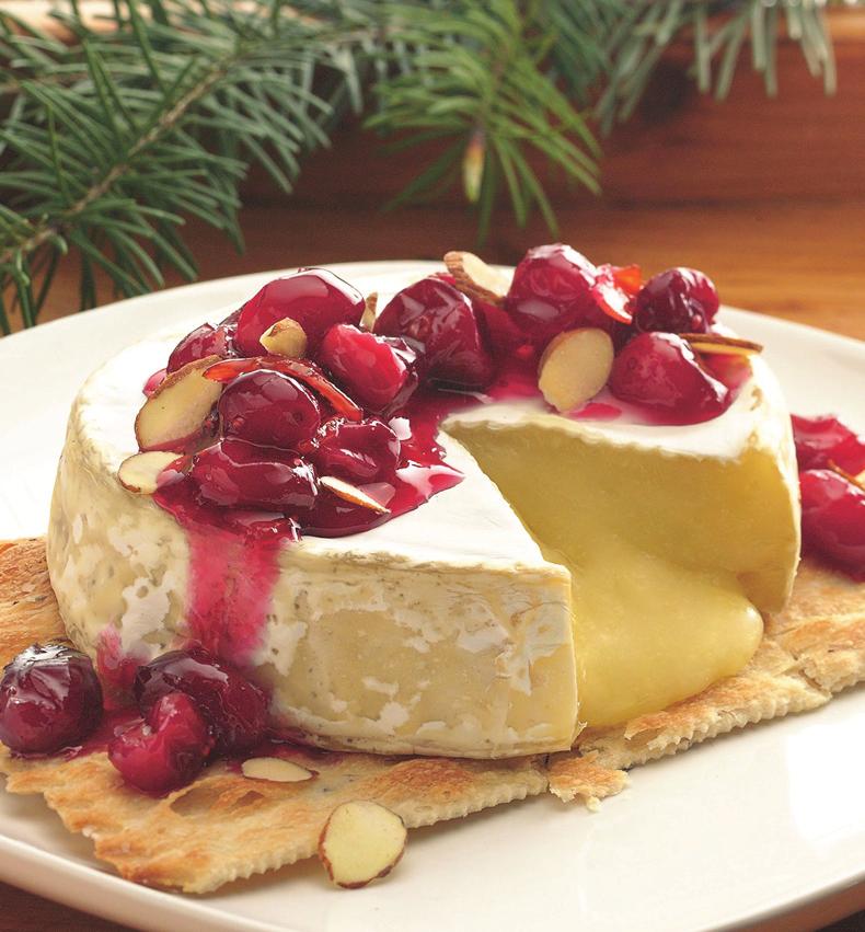 Cranberry- Topped Brie PREP TIME: 5 min TOTAL TIME: 5 min MAKES: servings Heat oven to 5 F. Place cheese on cookie sheet. Bake 0 to 5 minutes or until softened.