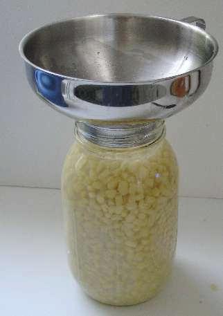 Add 1 cup of hot water for each quart of corn. Heat the corn to boiling and simmer 5 minutes.