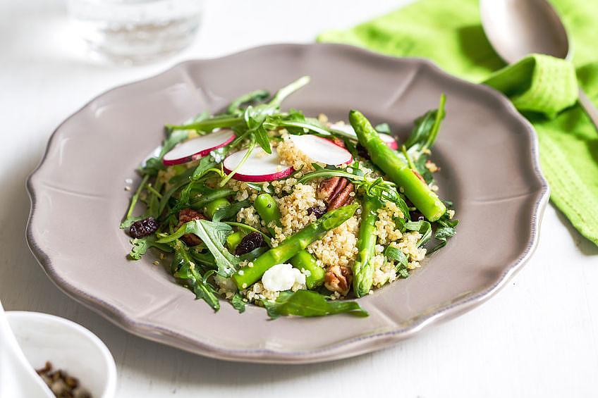 QUINOA AND ASPARAGUS 1/2 cup quinoa 1/2 tsp. olive oil 1/2 small onion, chopped 1 garlic clove, sliced 1 bunch asparagus For the Dressing: Juice from 1/2 lemon 2 tbsp.