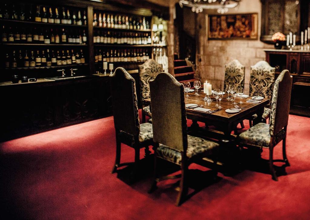 The Crypt Rich & historic With dark wood panelling, carved oak furniture and the Royal coat of arms over the fireplace, The Crypt is alluringly atmospheric.