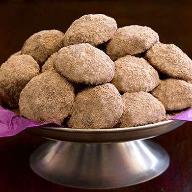 Chocolate Mexican Wedding Cookies Yield: 48 cookies 3 / 4 cup Ghirardelli Sweet Ground Chocolate and Cocoa cup (2 sticks) unsalted butter, at room temperature / 2 cup confectioners' sugar 2 teaspoons