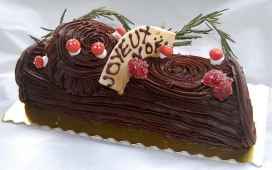 La Bûche de Noël Bûche de Noël is the French name for a Christmas cake shaped like a log. This one is a heavenly flourless chocolate cake rolled with chocolate whipped cream.