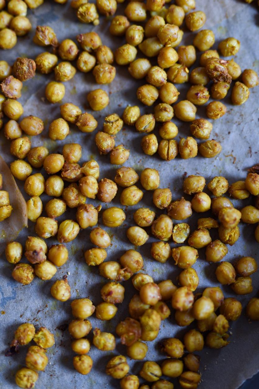 MEAL PREP ONE - DAY 25 BAKE THE CURRIED CHICKPEAS Makes 2 servings 2 cups of cooked chickpeas 1 tbsp olive oil 1 tbsp curry powder 1 pinch chili flakes 1/2 tsp sea salt 2 garlic cloves, minced 1