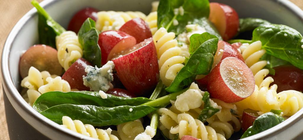 Pasta with Grapes, Blue Cheese and Spinach Makes 6 servings Perfect for a potluck, picnic or party, this salad is anything but ordinary.