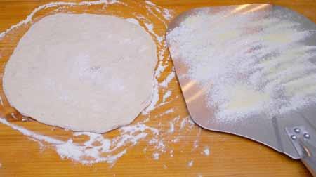 dough loaves. Place on a dusted surface, dust liberally with flour, and cover with plastic. Allow to rest for at least an hour while you heat the oven and your pizza stone.