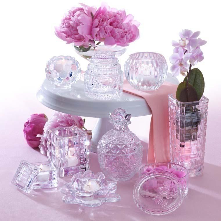 Celebrations by Mikasa Crystal Giftables The Celebrations by Mikasa Crystal Giftables collection includes items such as bud vases, votive holders, ring holders, and covered boxes, ranging in price