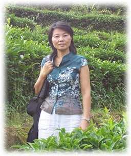 About En Jie The public face of Valley Green Tea is En Jie, whose varied background and experiences have uniquely qualified her to both source quality Chinese teas at good prices and provide comment