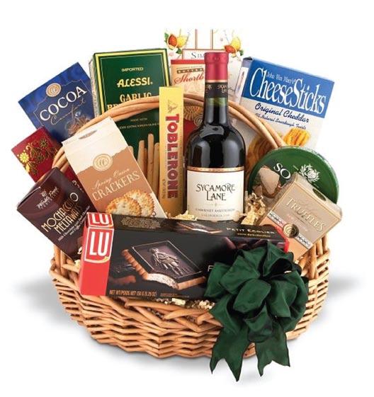 Traditional Wine and Gourmet Basket - $99 Wine Choice: Red or White Our traditional wine gift basket of one bottle of select red or white wine is accompanied by an assortment of fine gourmet foods in