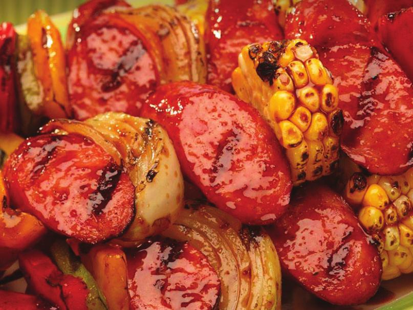 Smoked Sausage Kabobs 1. Preheat the grill to medium high. 2. Cut the sausages on the diagonal into 1½ pieces. 3. Thread the sausage and vegetables alternately onto skewers. Set aside. 4.