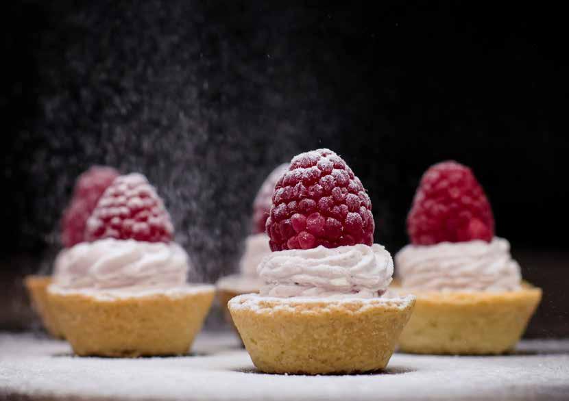 Raspberry BAKELS CREAM BAKBEL 70% RASPBERRY FILLING Raspberry Mini Tarts 0.150 kg 0.600 kg Pastry Tartlet Base Take a 1.5 pastry tartlet and fill with a small amount of BAKBEL 70% RASPBERRY FILLING.