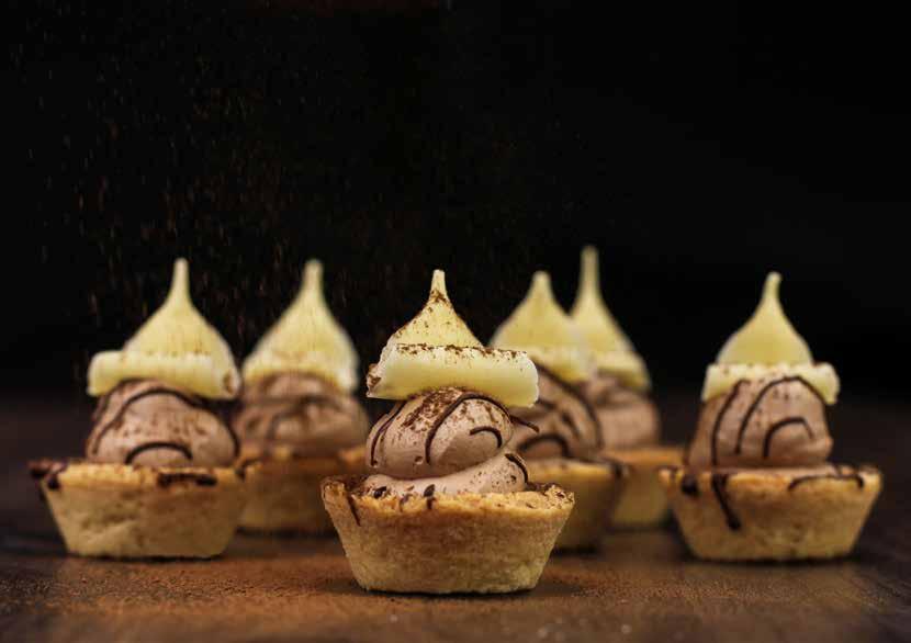 Chocolate BAKELS CREAM CHOCOLATE Chocolate Caramel Mini Tarts chocolate Pastry Tartlet Base Take a 1.5 pastry tartlet and fill with a small amount of BAKELS RTU CARAMEL SAUCE.