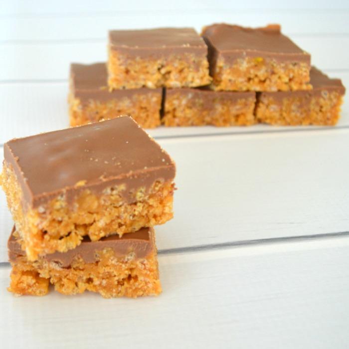 PEANUT BUTTER & RICE BUBBLE SLICE 3 cups of Rice Bubbles ½ cup of rice malt syrup ½ cup of smooth peanut butter 200g of milk chocolate ½ tsp of vegetable or canola oil 9. 10.