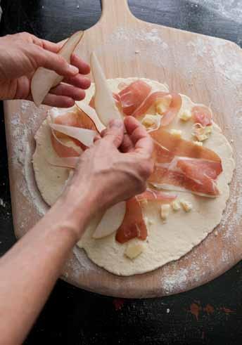 Using a rolling pin, roll the dough into a 10-inch round.