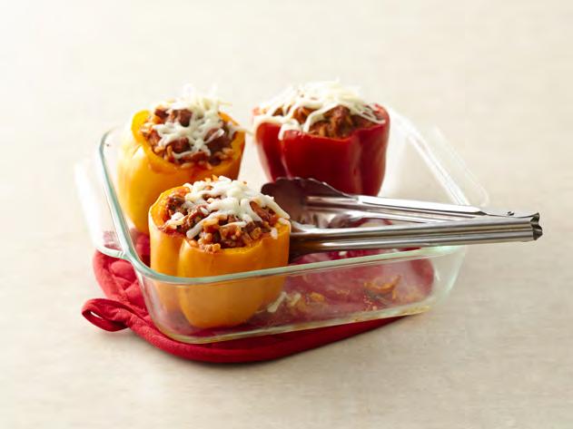 Stuffed Peppers 4 large bell peppers (any color) lb lean (at least 80%) ground beef tablespoons chopped onion cup cooked rice teaspoon salt clove garlic, finely chopped can (5 oz) Muir Glen organic