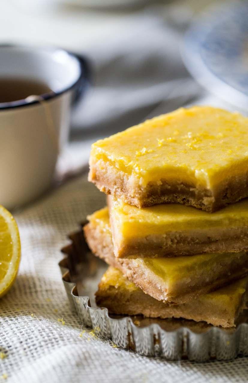 serves 9-12 PALEO LEMON BARS {Super Simple} PREP TIME: 15 mins COOK TIME: 30 mins FOR THE CRUST: FOR THE LEMON TOPPING: 1/4 Cup Honey 1/2 Cup Coconut Oil at room temperature (it should be the