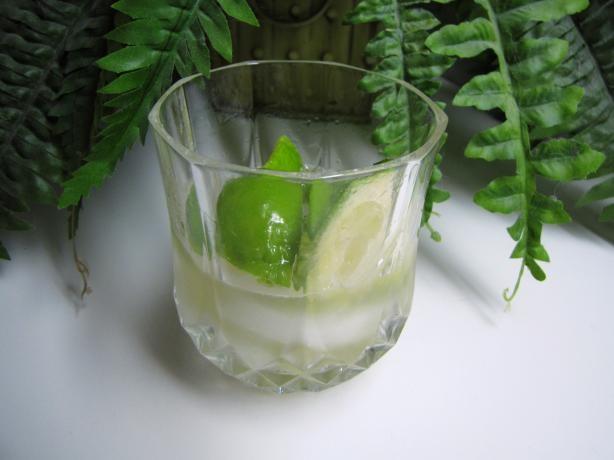 Ingredients: 1 lime, cut into 4th 's 2 tablespoons sugar 1 fluid ounce vodka 4 ice cubes Directions: Wash the lime and cut