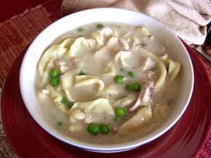 Chicken Soup with Homemade Egg Noodles To us, this is the ultimate in comfort food. We have fond memories of chicken soup simmering on the stovetop and Mom rolling out rich egg noodles on the counter.