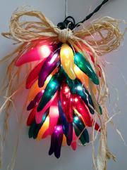 Autumn Harvest Ristra Item number: 53PL Item number: 53RHM Item number: 53CAR Red/Yellow/Purple Try a tradition of the southwest with one of our lighted chili ristras, complete with a raffia bow and