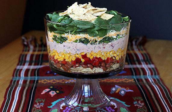9 Skinny Fiesta Layered Salad A creamy seasoned yogurt replaces the calorie laden mayo/sour cream often found in other layered salad recipes.