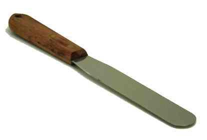 Metal Spatula A metal spatula has a long, flexible blade with a