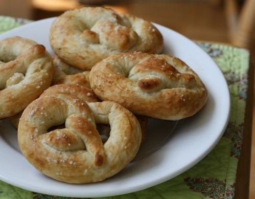 Soft Giant Pretzels INGREDIENTS: 1 1/8 cups water (70 to 80 degrees F) 3 cups all-purpose flour 3 tablespoons brown sugar 1 ½ teaspoons active dry yeast 2 quarts water ½ cup baking soda Salt