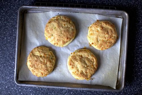 Sour Cream and Cheddar Biscuits Adapted from Gourmet 1 ½ cups all-purpose flour 2 tsp baking powder ½ tsp baking soda ½ tsp salt 2 Tbsp cold unsalted butter, cut into bits ¼ pound sharp Cheddar