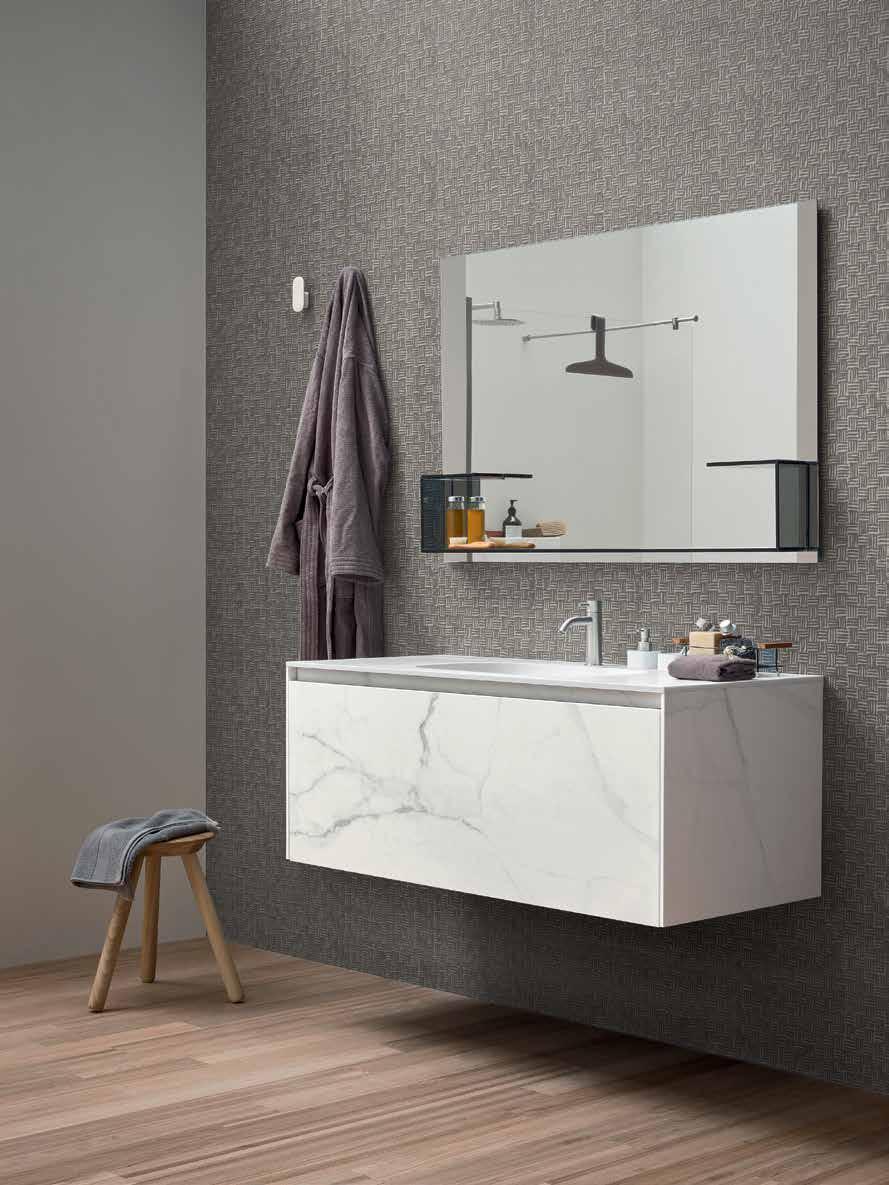 integrated top in Glacier White Corian, bowls, tooth-brush holder and soap dispenser. mirror with grey glass shelf 120x80h cm. Single coat hanger in Glacier White Corian.