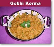 5.Serve hot with parathas. GOBHI KORMA Cauliflower florets cooked in curd with spicy masalas Chili Powder 1 tsp. Coriander seeds 1 tsp. Cumin Seeds ½ tsp. Vegetable Oil ¼ cup Curd ½ cup Cardamom 1 no.