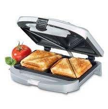 Ingredients 4 slices of bread sandwich toaster Butter table knife 2 slices of cooked ham chopping board 100g grated cheese