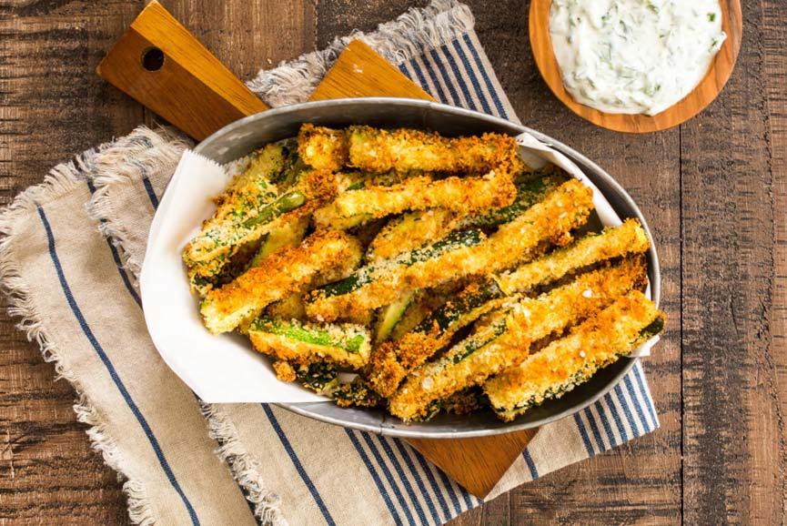 APPETIZERS Parmesan Zucchini Fries with Herb Dipping Sauce 2 medium zucchinis 1 cup panko 1 cup Italian style bread crumbs FOR THE SAUCE: 3/4 cup Greek yogurt 1/4 cup sour cream 1 tablespoon minced