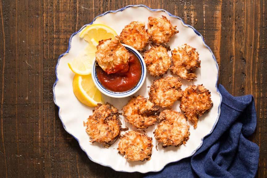 MAIN ENTREES Coconut Shrimp 1/4 cup cornstarch 1 teaspoon salt 2 egg whites 1 cup flaked sweetened coconut 1/2 pound large raw shrimp SERVES 4 In one shallow bowl, combine the cornstarch and salt.