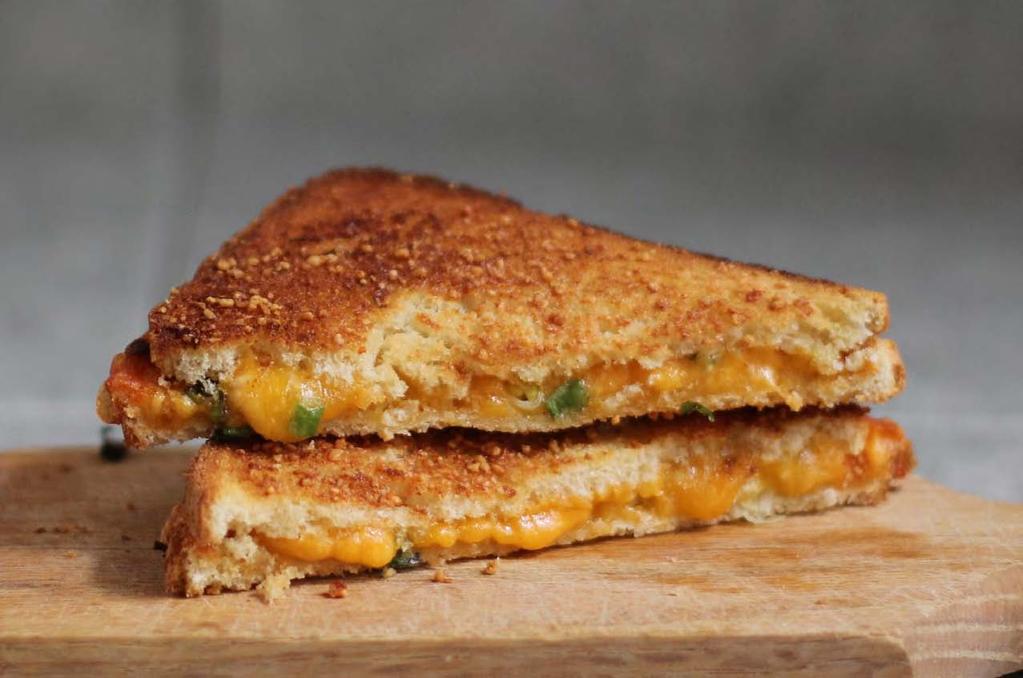 MAIN ENTREES 56 Grilled Scallion Cheese Sandwich Bring your grilled cheese sandwich to the next level with scallions mixed into the cheese.