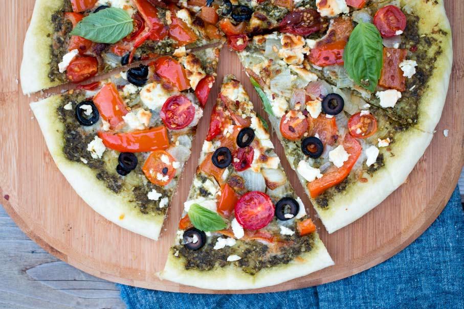 YIELD 2-4 SERVINGS COOKING TIME 12-15 MINUTES CLASSIC PIZZA CRUST OR STORE-BOUGHT CRUST ½ CUP PREPARED PESTO ½ CUP CHERRY TOMATOES, HALVED 1 TBSP. VEGETABLE OIL 1/2 RED BELL PEPPER, DICED 1/4 C.