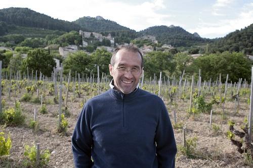 France, Rhone: Saint Cosme Retrospective Louis Barruol standing in his Le Claux Vineyard The leading producer in Gigondas, Saint Cosme has been run by the passionate and talented Louis Barruol since