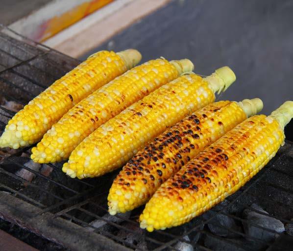 Barbequed Corn with Tomato and Almond Salad 200g cherry or grape tomatoes, quartered 1 eschalot, halved, thinly sliced 2 tbsp olive oil, plus extra to brush 1 tbsp red wine vinegar 5 fresh corn cobs,