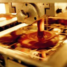 The liquid chocolate is processed further into blocks callets or other solid shapes.