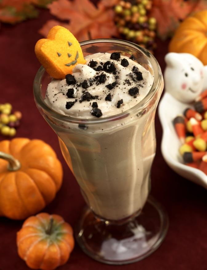 Graveyard shakes 1 ¼ cup milk 1 tablespoon chocolate syrup 1 large scoop chocolate ice cream 1 large scoop vanilla ice cream 2 Oreo cookies, finely crushed 1 soft ghost-shaped marshmallow Combine