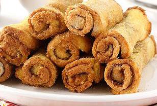 French Toast Rolls-Ups Makes 8 servings Prep Time: 20 minutes Cook Time: 20 minutes 6 slices white sandwich bread cup MUSSELMAN S Apple Butter 2 eggs ¼ cup milk ¼ teaspoon cinnamon teaspoon nutmeg 2