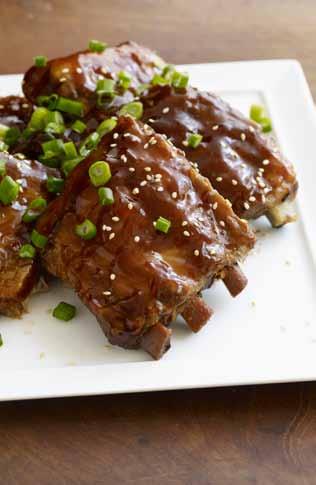 sesame oil 2 tablespoons rice vinegar 2 tablespoons minced fresh ginger 4 cloves garlic, crushed 1/2 teaspoon red pepper flakes 1 rack pork ribs (about 3 pounds) cut into sections of 3 to 4 ribs 2