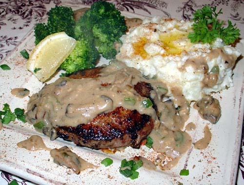 Plate Presentation Drizzle onion sauce around service plate and dust plate with Cajun spice. Put one tablespoon of sauce onto the plate and rest Salisbury steak atop sauce.
