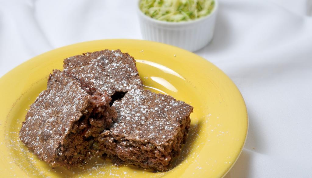 CHOCOLATE CHIP ZUCCHINI CAKE MAKES 9 SERVINGS 1/2 cup butter or margarine, softened 1 cup sugar 1 cup white whole wheat flour 2 tbsp unsweetened cocoa 1/2 tsp baking soda 1/4 tsp baking powder 1/4