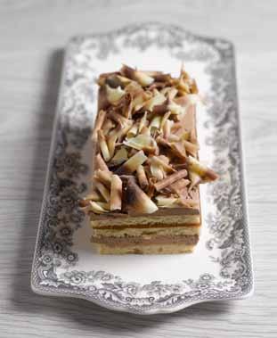 mix, follow standard recipe. 2 Sandwich together Genoese layers and coat sides of cake with beaten Vanilla Crembel coloured green and flavoured with peppermint. Use approx. 0.2% to Chocolate Crembel.