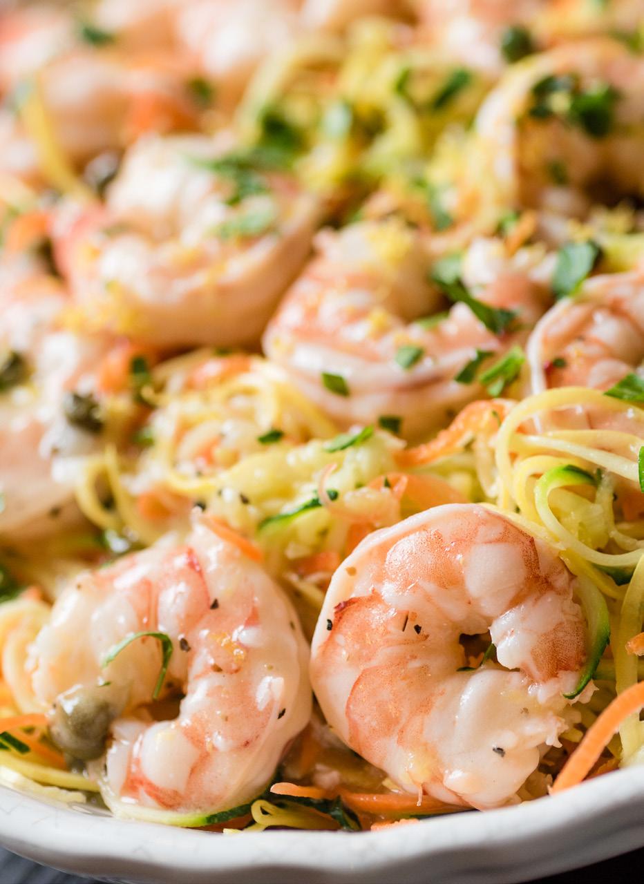 Lemon Garlic Shrimp & Veggie Pasta Serves: 4-6 2 large zucchini 2 large yellow squash 2 large, thick carrots, peeled 3/4 cup butter 4 cloves garlic, minced 1 tablespoon cornstarch 1/2 cup chicken