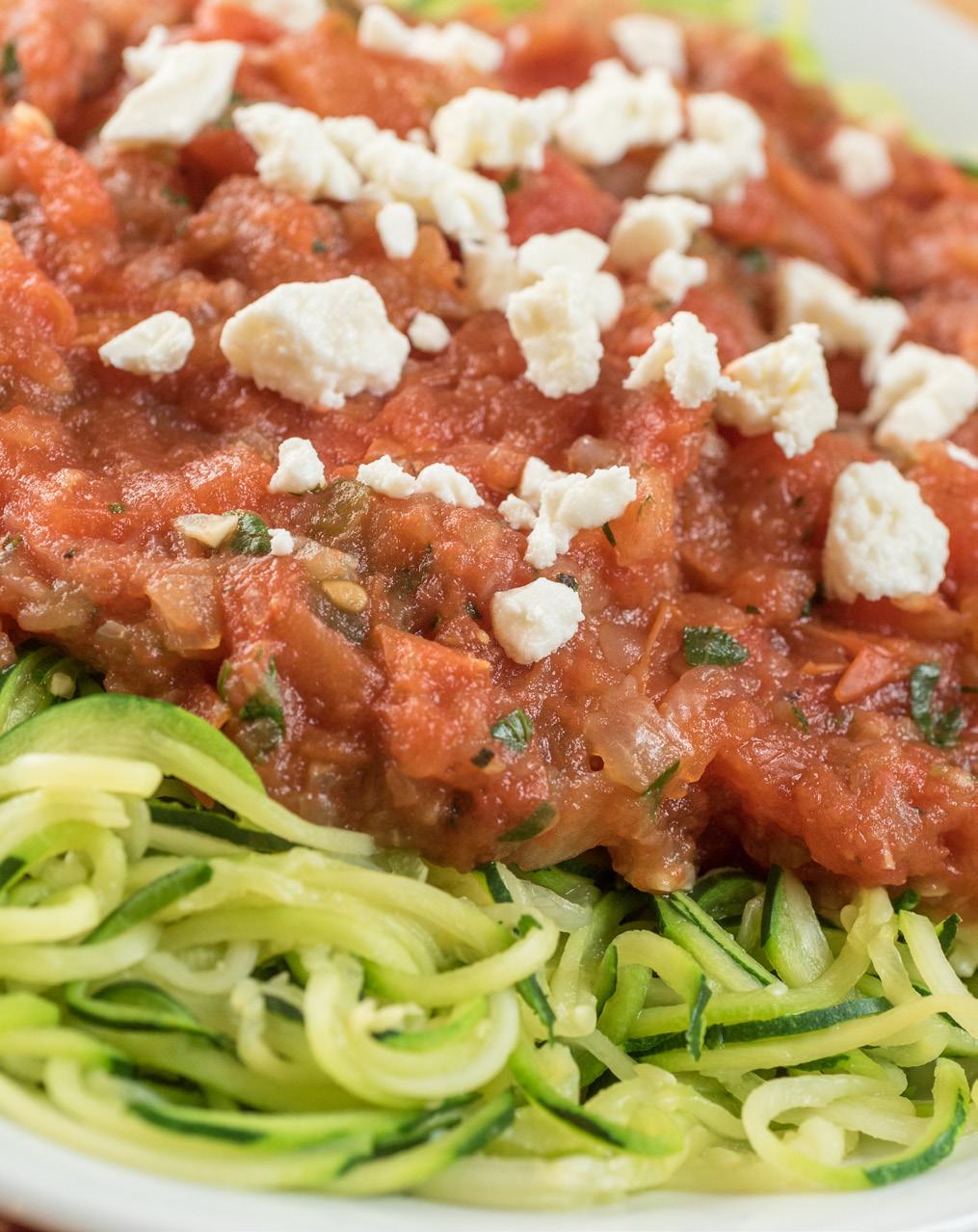 Zucchini Noodles with Salsa & Feta Serves: 4-6 4 medium zucchini 1 tablespoon olive oil 1 large onion, chopped 2 cloves garlic, chopped 4 pounds plum tomatoes, cored and chopped 1 small jalapeño